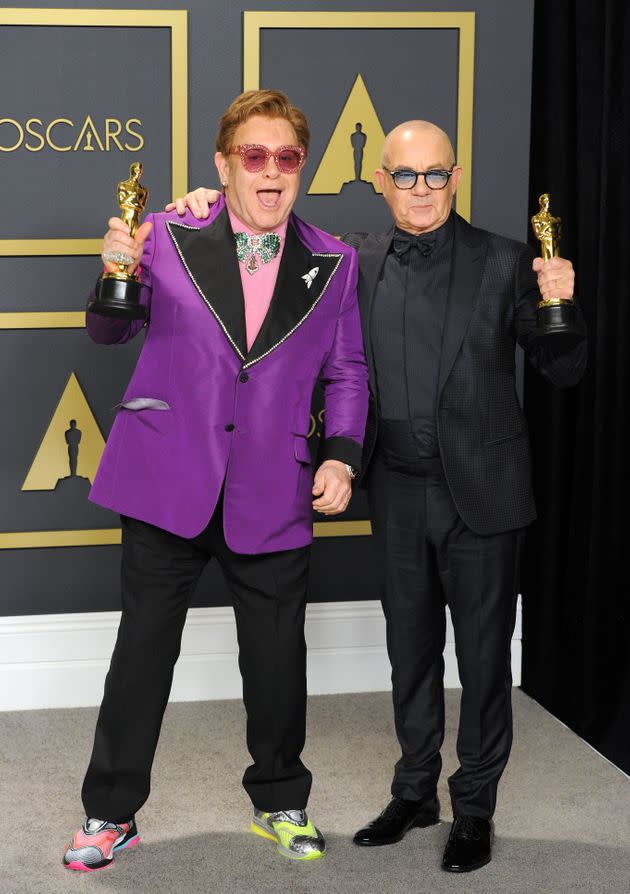 Sir Elton John and Bernie Taupin celebrating their win at the Oscars in 2020