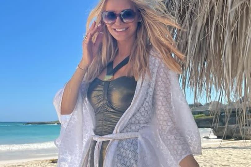 Tess was also seen beaming and posing up a strom on the beach -Credit:Tess Daly Instagram
