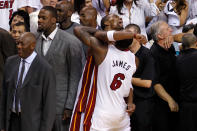 Chris Bosh #1 and LeBron James #6 of the Miami Heat celebrate after they won 121-106 against the Oklahoma City Thunder in Game Five of the 2012 NBA Finals on June 21, 2012 at American Airlines Arena in Miami, Florida. NOTE TO USER: User expressly acknowledges and agrees that, by downloading and or using this photograph, User is consenting to the terms and conditions of the Getty Images License Agreement. (Photo by Mike Ehrmann/Getty Images)