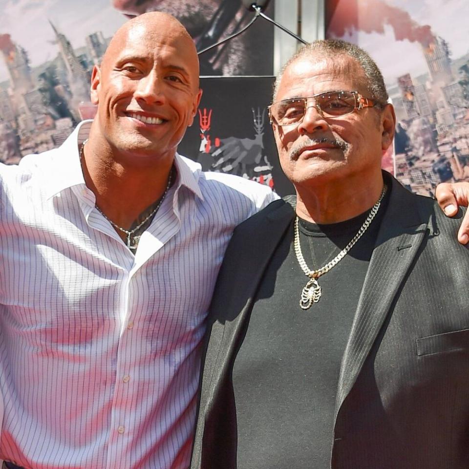 Dwayne Johnson and his father Rocky Johnson | Rob Latour/Shutterstock