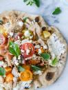 <p>Is it lunch time yet?</p><p>Get the recipe at <a href="http://www.howsweeteats.com/2015/08/smoky-grilled-chicken-pita-flatbreads-with-creamy-feta/?m" rel="nofollow noopener" target="_blank" data-ylk="slk:How Sweet It Is" class="link ">How Sweet It Is</a>.</p>