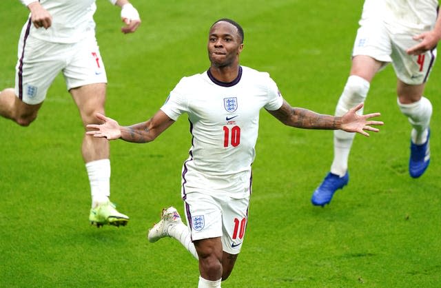 Raheem Sterling celebrates his goal against Germany which helped England secure a quarter-final place 