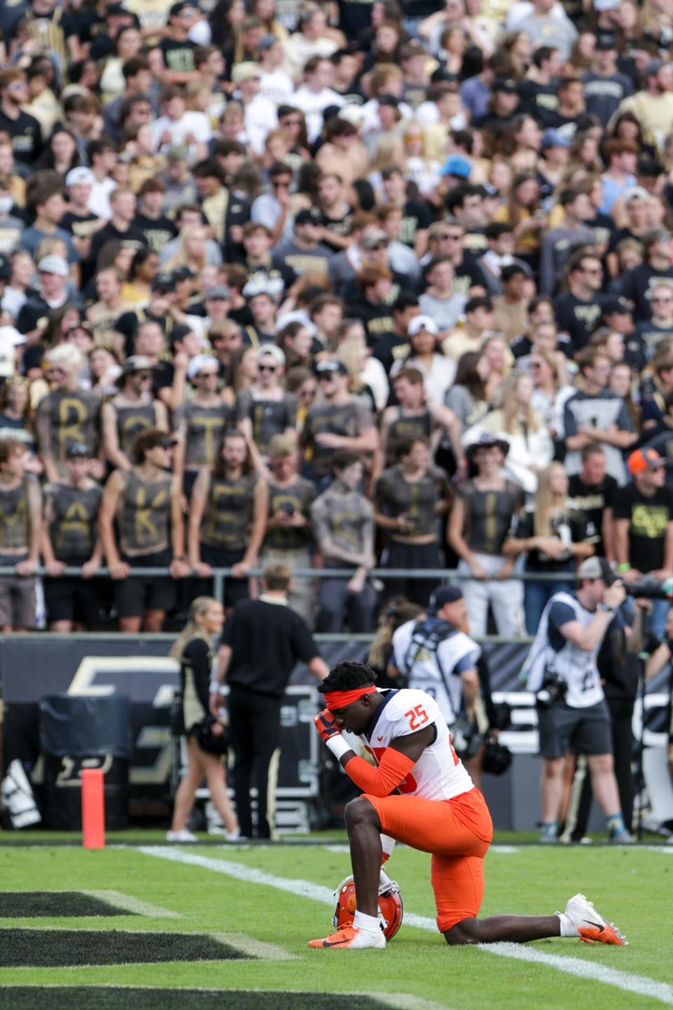Illinois defensive back Kerby Joseph (25) kneels in the end zone before the first quarter of an NCAA college football game, Saturday, Sept. 25, 2021 at Ross-Ade Stadium in West Lafayette, Ind.