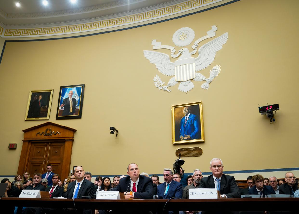 From left to right, Ryan Graves, executive director of Americans for Safe Aerospace, David Grusch, former National Reconnaissance Officer Representative of Unidentified Anomalous Phenomena Task Force at the U.S. Department of Defense, and Retired Navy Commander David Fravor, testify before Congress on July 26 about UFOs.