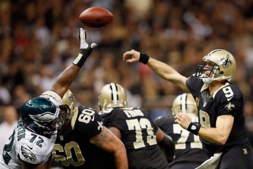 Drew Brees of the New Orleans Saints throws a pass over Cedric Thornton of the Philadelphia Eagles at Mercedes-Benz Superdome on November 5, in New Orleans, Louisiana. The Saints will rely on their on star quarterback Brees when the Atlanta Falcons, 8-0 for the first time in club history, will launch the second half of their campaign at NFC South division rivals New Orleans on Sunday