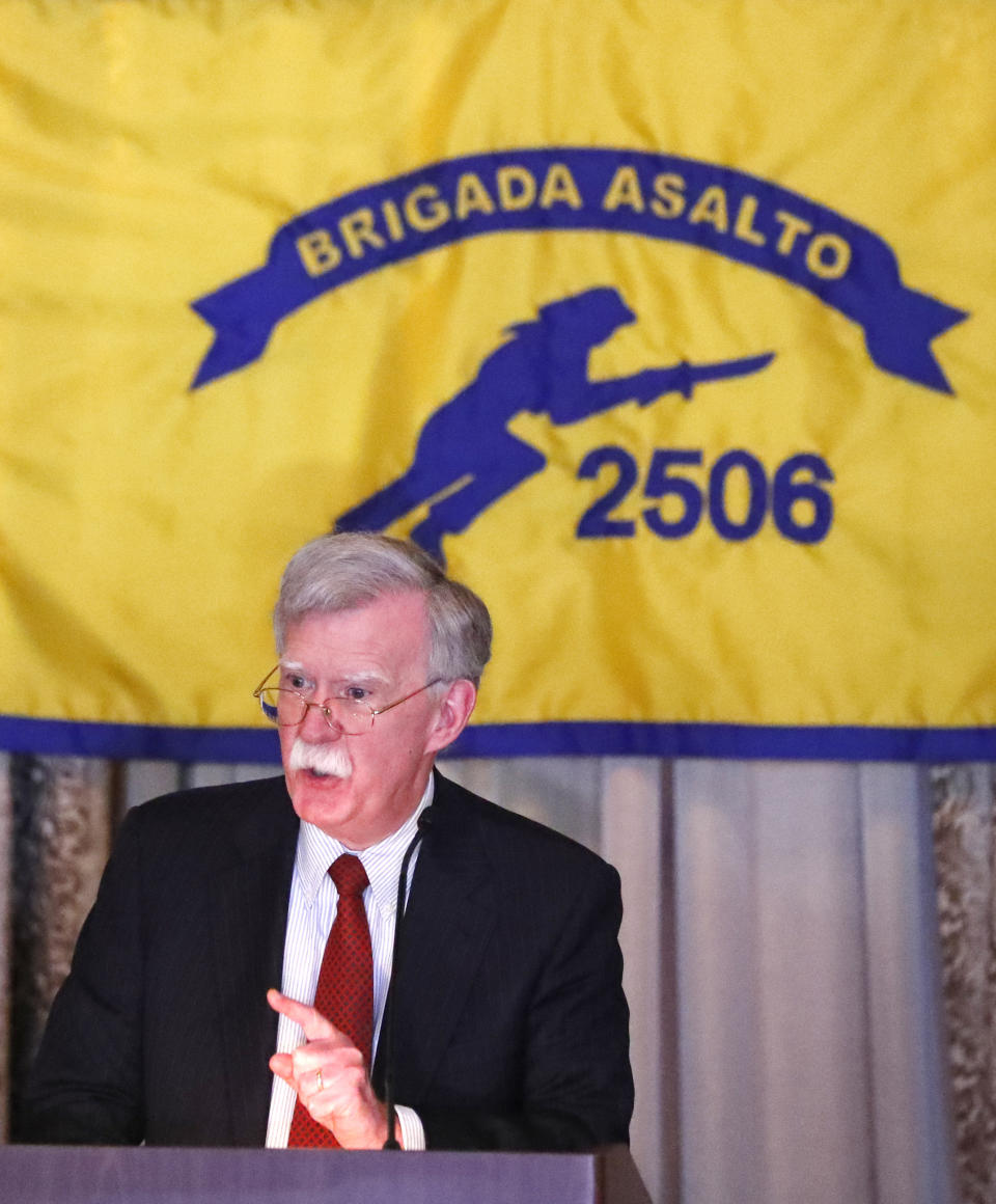 National security adviser John Bolton gestures while discussing administration new policy during a speech, Wednesday, April 17, 2019, in Coral Gables, Fla., at the Bay of Pigs Veterans Association on the 58th anniversary of the United States' failed 1961 invasion of the island, an attempt to overthrow the Cuban government. The Trump administration on Wednesday intensified its crackdown on Cuba, Nicaragua and Venezuela, rolling back Obama administration policy and announcing new restrictions and sanctions against the three countries whose leaders national security adviser John Bolton dubbed the "three stooges of socialism." (AP Photo/Wilfredo Lee)