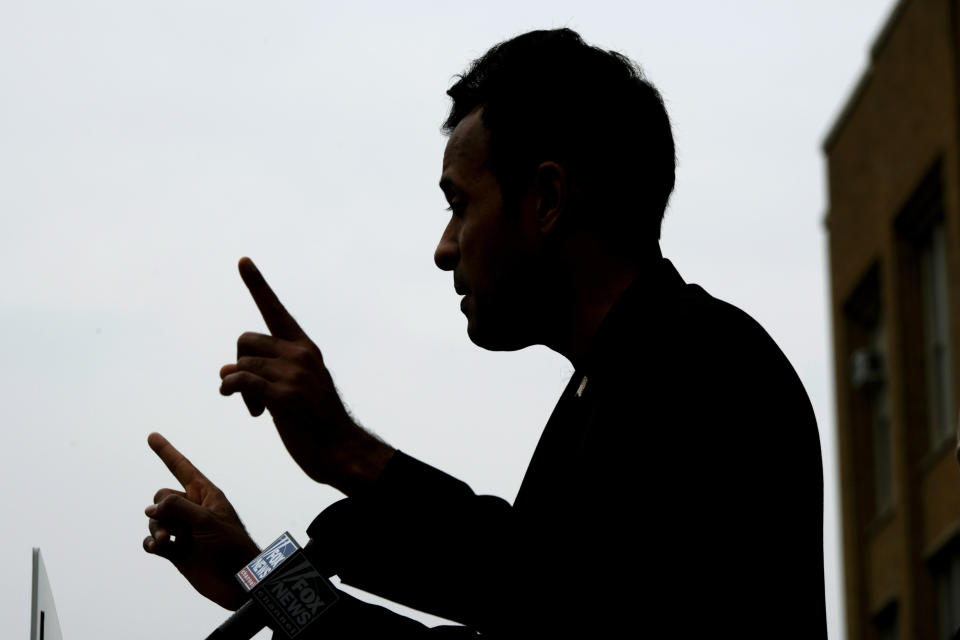 FILE - Republican Presidential candidate Vivek Ramaswamy speaks outside the shuddered former South Shore High School where the city of Chicago is planning to house illegal migrants Friday, May 19, 2023, in Chicago. (AP Photo/Paul Beaty, File)