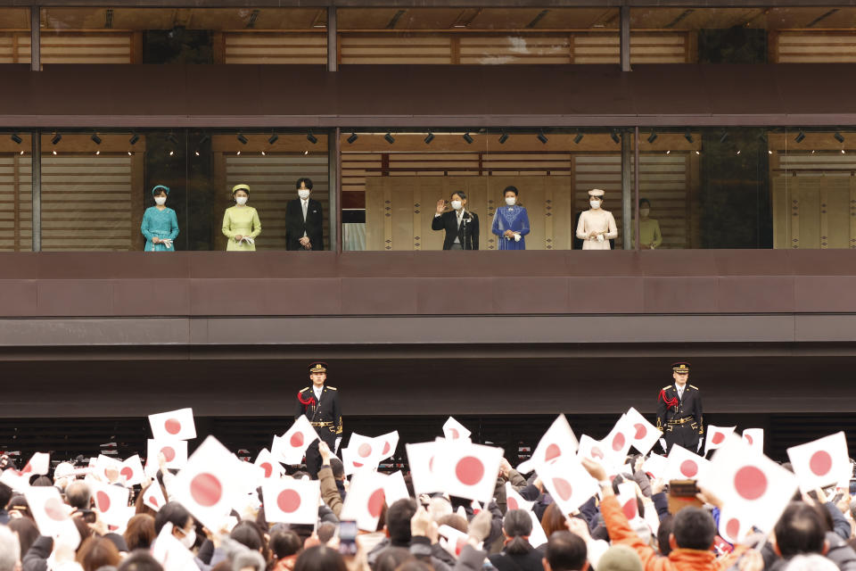 Japan's Emperor Naruhito, fourth left, standing next to Empress Masako, in blue, and their daughter Princess Aiko, in pink, waves to audience members during his birthday celebration at the Imperial Palace in Tokyo, Thursday, Feb. 23, 2023. Crown Prince Akishino, third left, his wife Crown Princess Kiko, second left, and their daughter Princess Kako also stand next to him. (Rodrigo Reyes Marin/Pool Photo via AP)