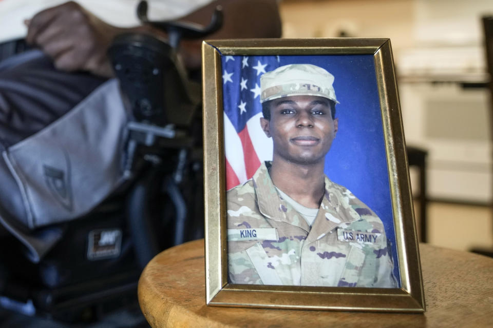 FILE - A portrait of American soldier Travis King is displayed as his grandfather, Carl Gates, talks about his grandson on July 19, 2023, in Kenosha, Wis. North Korea says on Wednesday, Sept. 27, it has decided to expel a U.S. soldier who crossed into the country through the heavily armed inter-Korean border in July. (AP Photo/Morry Gash, File)