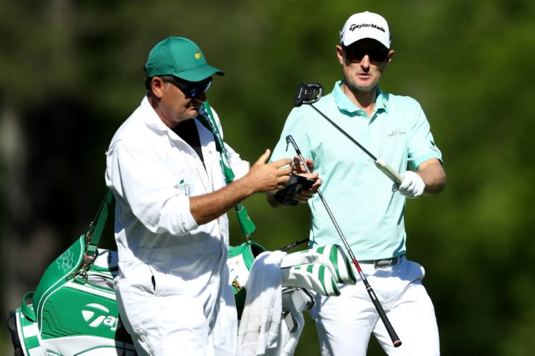 Justin Rose (R) birdied five of the last seven holes to shoot 67 in ideal conditions and join Sergio Garcia in the lead entering the last round of the 2017 Masters Tournament