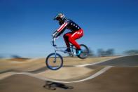 U.S. Olympic BMX athlete Connor Fields takes some air over rollers as he trains at the Olympic Training Center in Chula Vista, California, United States, July 23, 2016. REUTERS/Mike Blake