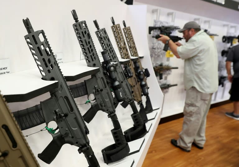 Sig Sauer rifles are displayed during the National Rifle Association convention on May 5, 2018 in Dallas, Texas