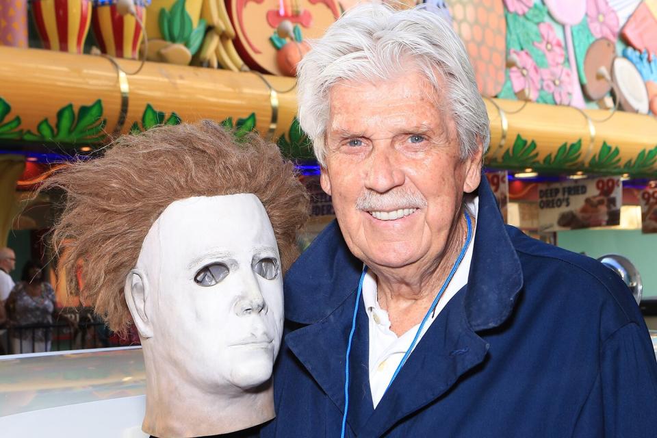 Actor and stuntman James Winburn arrives with a Michael Myers mask at the opening ceremony of Las Vegas Car Stars at the Fremont Street Experience on May 17, 2013 in Las Vegas, Nevada.