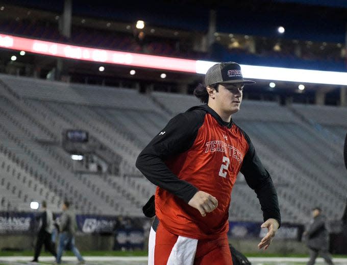 Texas Tech quarterback Behren Morton, shown during pre-game warmup at the Independence Bowl, will sit out the rest of spring practice to continue rehabilitating the right shoulder injury he suffered last September. Tech announced Morton's ceasing participation on Wednesday, just before the Red Raiders' eighth of their 15 spring workouts.