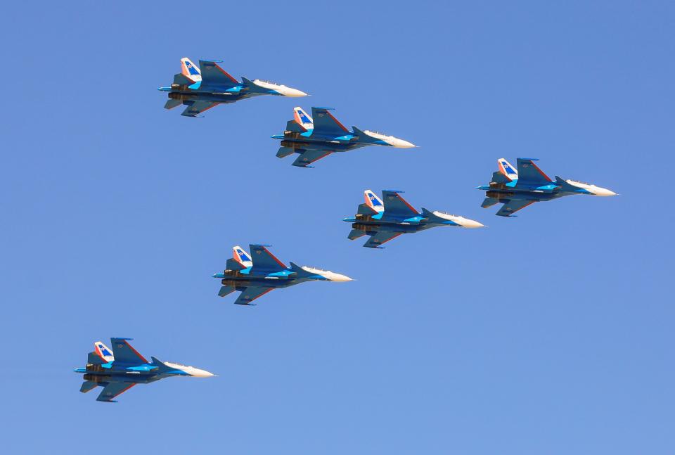 Russian Knights perform during the Dubai Airshow, in Dubai