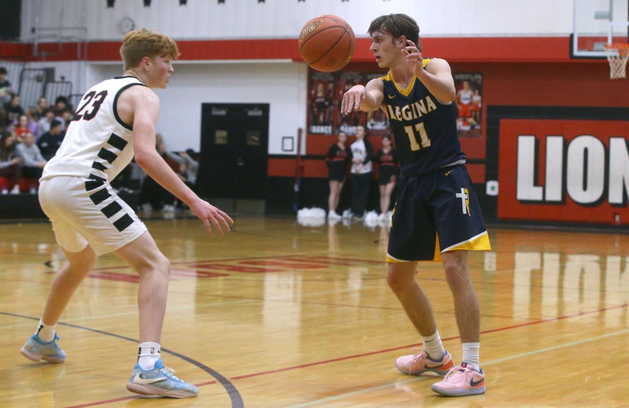 Regina's Michael Martin (11), seen here in game versus Lisbon, finished with a team-high 22 points against Tipton on Jan. 23.