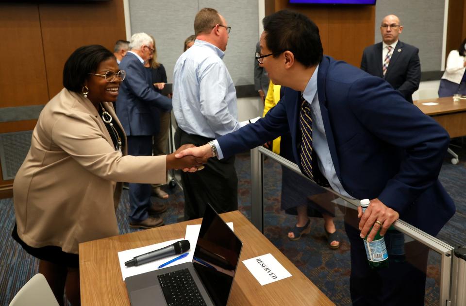 Adele Brumfield, the vice provost for enrollment management greets Dr. Santa Ono, the new president of the University of Michigan who she hadn't seen since they met in the 2000s at Emory University where he was the senior vice provost and deputy to the provost at Emory University. The U of M Board of Regents voted Ono as the fifteenth president at the University of Michigan during a meeting at the Ruthven Building at the Ann Arbor campus on July 13, 2022.