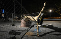 The damaged statue of soccer player Zlatan Ibrahimovic next to Stadion football arena in Malmo, Sweden, Sunday Jan. 5, 2020. Ibrahimovic, who recently joined Italian side AC Milan, angered fans of his boyhood club, Malmo, in November when he bought a stake in one of Swedish title rivals, Hammarby, and outlined his desire to make the Stockholm-based team “the best in Scandinavia". (Johan Nilsson/TT via AP)