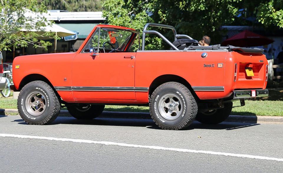 <p>When a manufacturer of heavy equipment and agricultural tractors decides to build a recreational four-wheel-drive vehicle, no one expects a featherweight. International’s Scout II was a heavy truck. At around 3500 pounds, it weighed more than either the Toyota FJ40 or the Jeep CJ-7 it competed against. The Scout II rode on a wheelbase 6.5 inches longer than the CJ and 10 inches longer than the FJs. The full-metal hardtop Scout was the best for packing away a weekend’s worth of stuff. But an even longer Scout was available called the Traveller, with a whopping 18-inch wheelbase stretch.<br><br></p><p>The Scout II could be optioned with one of two big V-8s, in 304- and 345-cubic-inch displacements. International even offered a Nissan-sourced diesel engine beginning in 1976. That Nissan diesel (even in turbocharged form) was sluggish, but delivered an impressive 30 mpg on the highway. The 1974 and later models were strongest and drove best, thanks to the standard Dana 44 front and rear axles and power disc brakes. There were plenty of interesting special-edition Scouts, but the coolest has to be the Soft Safari (SSII) from 1977-1979. It had a full convertible top, an integrated roll bar and larger tires on white spoke wheels. The metal doors were replaced with partial openings made of fiberglass-so you could hop in and out of an SSII just as you could an open-top Jeep CJ.<br><br></p><p>Owning one of these hardy machines gains you entrance into a tight group of helpful enthusiasts. <a rel="nofollow noopener" href="http://www.superscoutspecialists.com/store/" target="_blank" data-ylk="slk:Super Scout Specialists;elm:context_link;itc:0;sec:content-canvas" class="link ">Super Scout Specialists</a> is a great resource for parts and information. International made tractors, 18-wheelers and full-size pickup trucks, so the Scout II was a small vehicle for this company. And some of the heavy-duty parts from its larger trucks work on the Scout. For example, the 392-cubic-inch V-8 from a pickup or Travelall SUV can be installed in a Scout.<br><br></p><p>The International Scout II, like Toyota’s FJ and the early Ford Bronco, is grabbing the attention of collectors. Hagerty values an average Scout II at around $14,000 and says top condition models go for over $20,000. The most collectible Scout is the SSII. Hagerty says an average SSII with the 345-cid V-8 is worth $17,300 and pristine models top $30,000.</p>