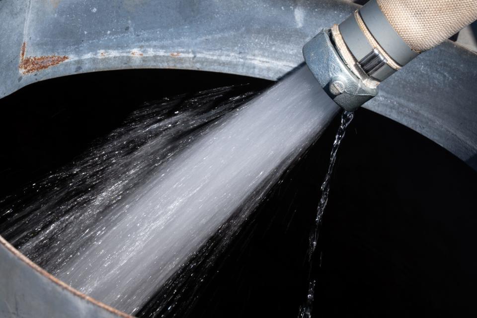 Groundwater is transferred to the storage tank at Hangry Donkey Sanctuary on June 22, 2023, in Rio Verde Foothills.