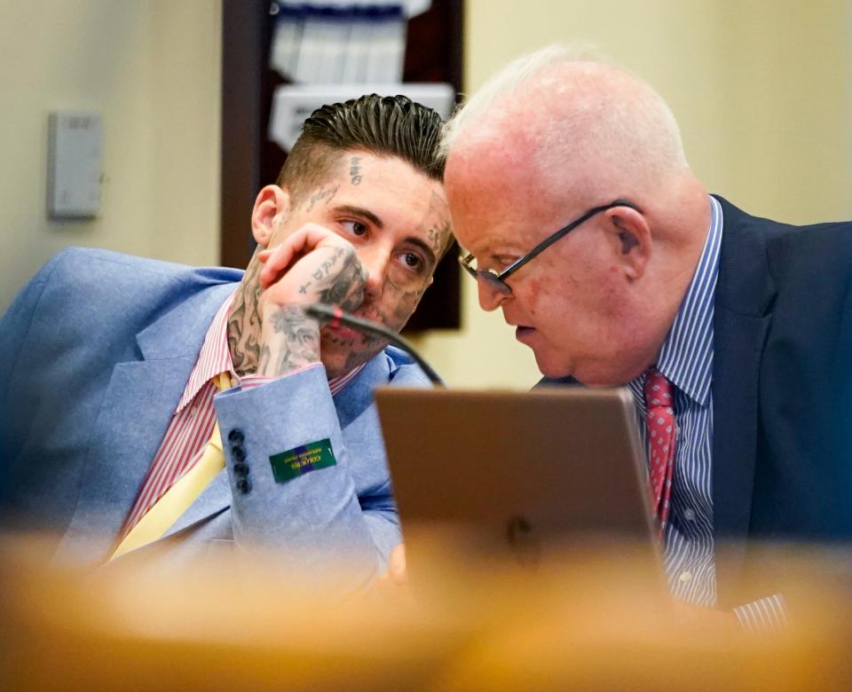 Wade Wilson speaks to an attorney during his capital murder trial at the Lee County Courthouse in Fort Myers on Monday, June 3, 2024. Wilson is facing two first-degree murder charges among others.