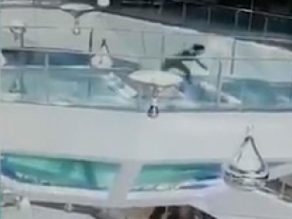 Woman falls into shark tank at Chinese mall during feeding time