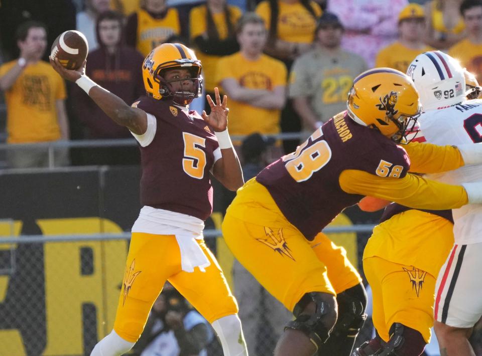 Nov 25, 2023; Tempe, Arizona, USA; Arizona State quarterback Jaden Rashada (5) throws a pass against Arizona during the third quarter at Mountain America Stadium. Mandatory Credit: Michael Chow-Arizona Republic