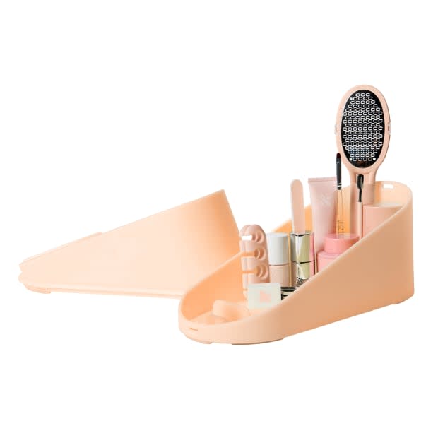 <p><strong>Olive & June The Pedi System, $70, <a href="https://oliveandjune.com/products/the-pedi-system" rel="nofollow noopener" target="_blank" data-ylk="slk:available here;elm:context_link;itc:0;sec:content-canvas" class="link ">available here</a>: </strong>"This genius kit makes at-home pedicures so much easier: It packs all of the tools you need to file, buff, shape, clip, polish and moisturize into a handy box that also doubles as a stand to rest your foot on while you work. I was able to finally get my haven't-had-a-professional-pedicure-in-9-months calluses under control (too much information?) <em>and</em> manage a halfway decent polish job with it." —Stephanie Saltzman, Beauty Director</p>