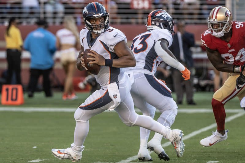 Denver Broncos quarterback Russell Wilson (L) will face the Miami Dolphins on Sunday in Miami Gardens, Fla. File Photo by Terry Schmitt/UPI