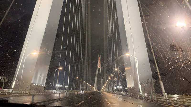 A road to Wuhan Tianhe International Airport is seen deserted due to the outbreak of novel Coronavirus in Wuhan