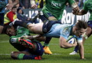 Bernard Foley (R) from the New South Wales Waratahs is tackled by Waisake Haholo from New Zealand's Highlanders during their Super Rugby semi-final match at the Sydney Football Stadium, Australia, June 27, 2015. REUTERS/David Gray