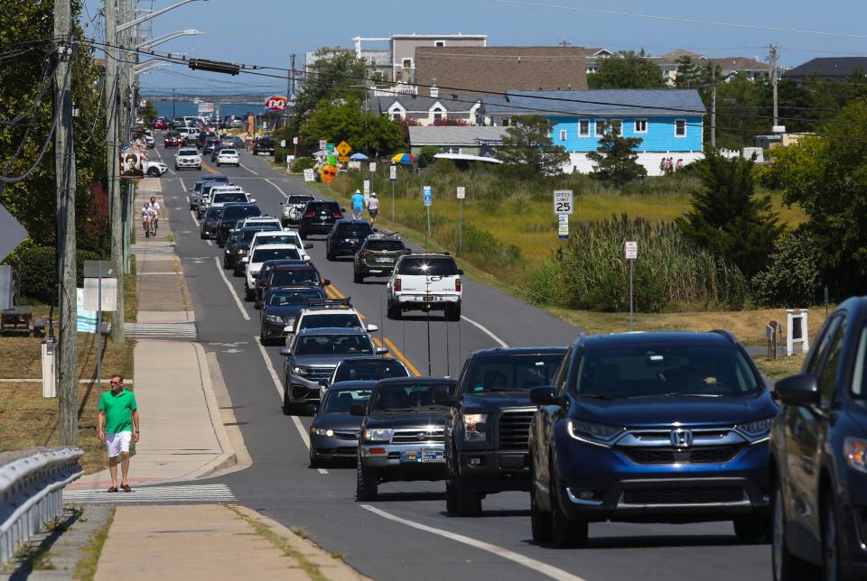 Traffic lines Savannah Road in Lewes as sunny weather brings crowds to the Delaware beaches, Saturday, August 21, 2022.