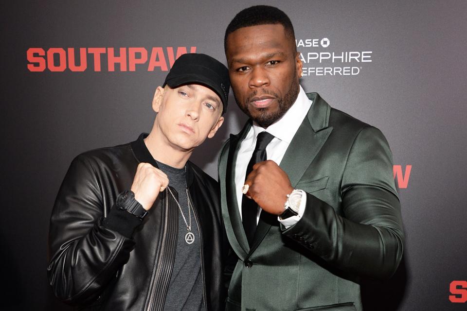 Eminem and 50 Cent attend the "Southpaw" New York premiere at AMC Loews Lincoln Square on July 20, 2015 in New York City.