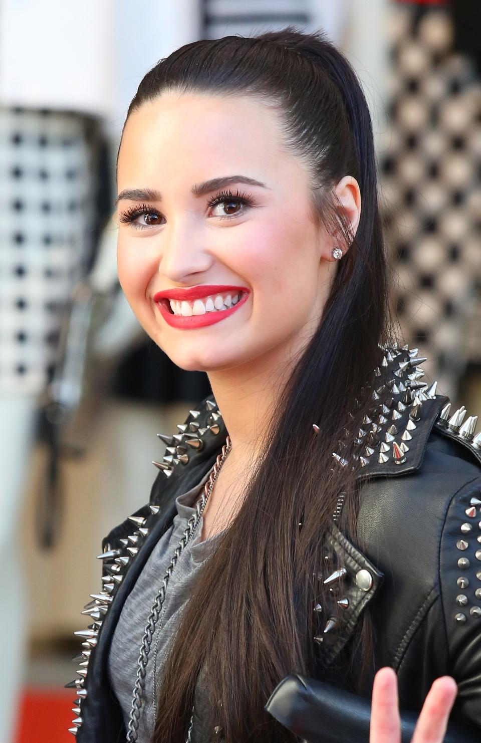 LOS ANGELES, CA - FEBRUARY 14: Demi Lovato attends Topshop Topman LA Grand Opening at The Grove on February 14, 2013 in Los Angeles, California. (Photo by JB Lacroix/WireImage)