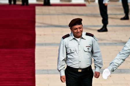 FILE PHOTO: New Israeli Chief of Staff Lieutenant-General Gadi Eizenkot smiles during a handover ceremony, in which he replaced Lieutenant-General Benny Gantz, at Kirya base in Tel Aviv, Israel February 16, 2015. REUTERS/Nir Elias/File Photo