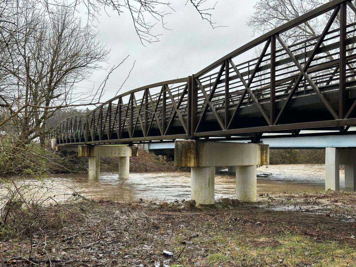 Racoon Creek, seen here on the south side of Granville, saw high waters after heavy rains on April 2.