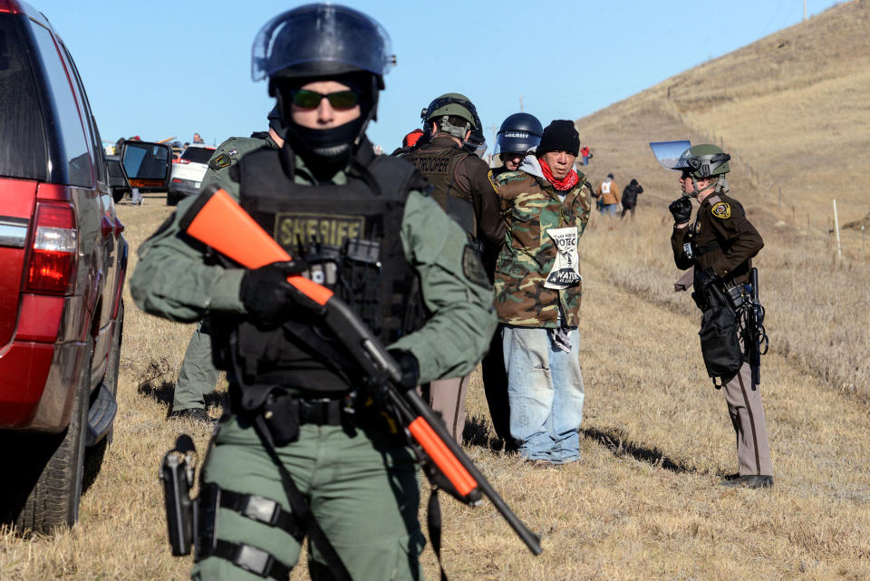 <p>A protester is arrested by police next to the pipeline route during a protest against the Dakota Access pipeline near the Standing Rock Indian Reservation in St. Anthony, North Dakota, U.S. November 11, 2016. (Photo: Stephanie Keith/Reuters) </p>