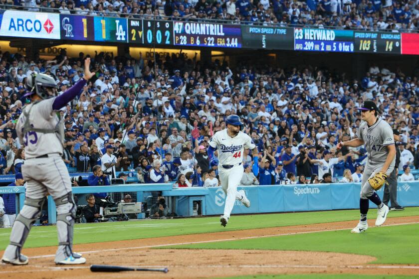 Los Angeles, CA, Saturday, June 1, 2024 - Colorado Rockies pitcher Cal Quantrill (47) looks on as Los Angeles Dodgers outfielder Andy Pages (44) scores on a double by Los Angeles Dodgers outfielder Jason Heyward (23) in the second inning at Dodger Stadium. (Robert Gauthier/Los Angeles Times)