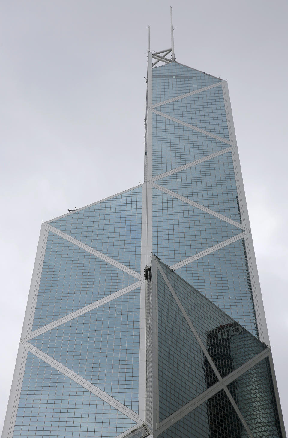 Bank of China Tower, a building designed by architect I.M. Pei, is seen in Hong Kong Friday, May 17, 2019. Pei, the globe-trotting architect who revived the Louvre museum in Paris with a giant glass pyramid and captured the spirit of rebellion at the multi-shaped Rock and Roll Hall of Fame, has died at age 102, a spokesman confirmed Thursday. (AP Photo/Vincent Yu)