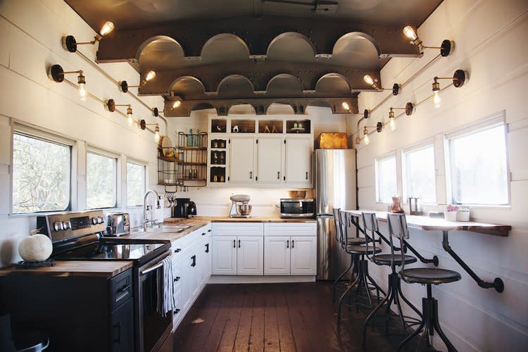 The ceiling has original archways that used to hang water tanks. Photo credit: Airbnb.