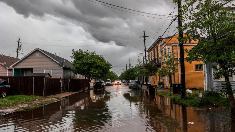 PHOTO: Storm clouds roll across New Orleans as water rises in the Treme neighborhood, April 10, 2024.  (Chris Granger/AP)
