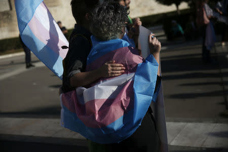 Protesters take part in a demonstration as the Greek Parliament debates a gender law that allows citizens to declare a gender change on official documents in Athens, Greece, October 9, 2017. REUTERS/Alkis Konstantinidis