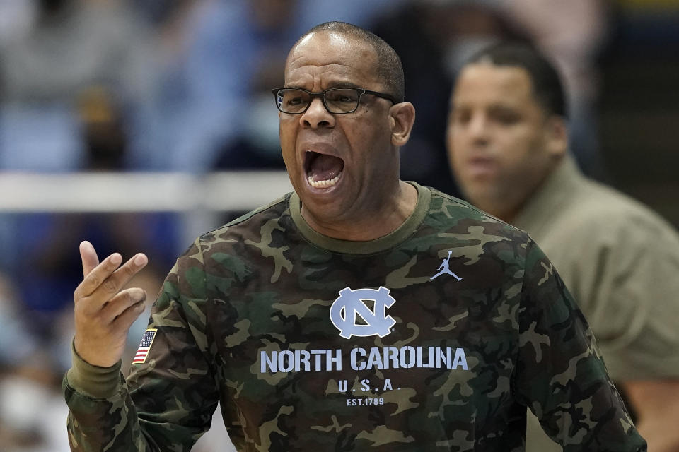 North Carolina head coach Hubert Davis directs his team during the first half of an NCAA college basketball game against Brown in Chapel Hill, N.C., Friday, Nov. 12, 2021. (AP Photo/Gerry Broome)