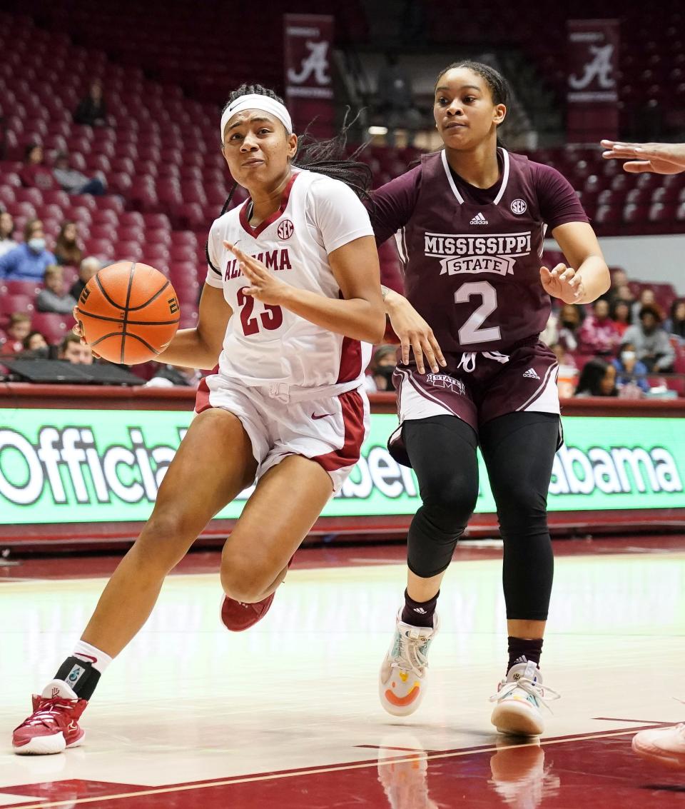 Alabama guard Brittany Davis (23) drives for a layup against Mississippi State guard JerKaila Jordan (2) in Coleman Coliseum Thursday, Jan. 6, 2021.