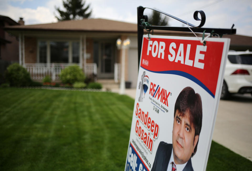 A house for sale through a realtor is seen in Hamilton, Ontario, Canada May 13, 2017. Picture taken May 13, 2017. REUTERS/Chris Helgren