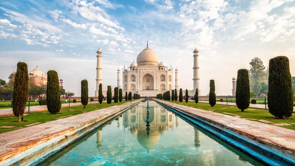 Visit the one-of-a-kind Taj Mahal.