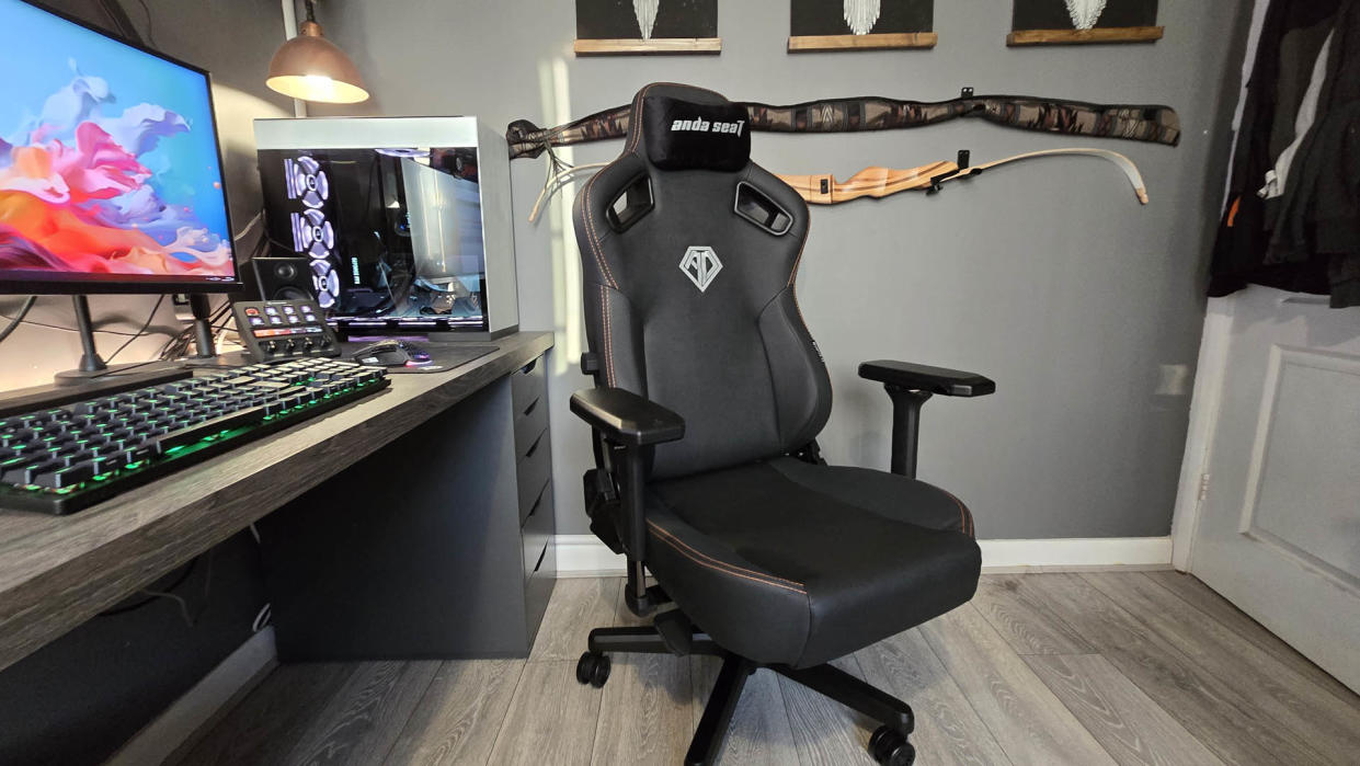  The AndaSeat Kaiser 3 XL gaming chair in an office and gaming space on a wooden floor. 
