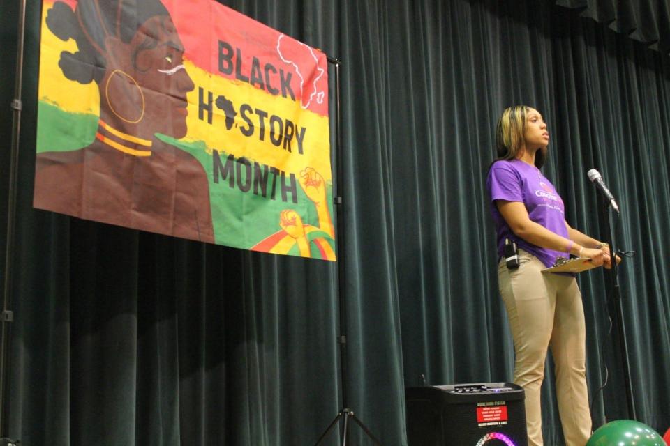 Ashley McClellan-Robinson, founder of Concrete Roses, speaks to Stephen Foster Elementary School students during the group's Black History Month event on Thursday.
(Photo: Photo by Voleer Thomas/For The Guardian)