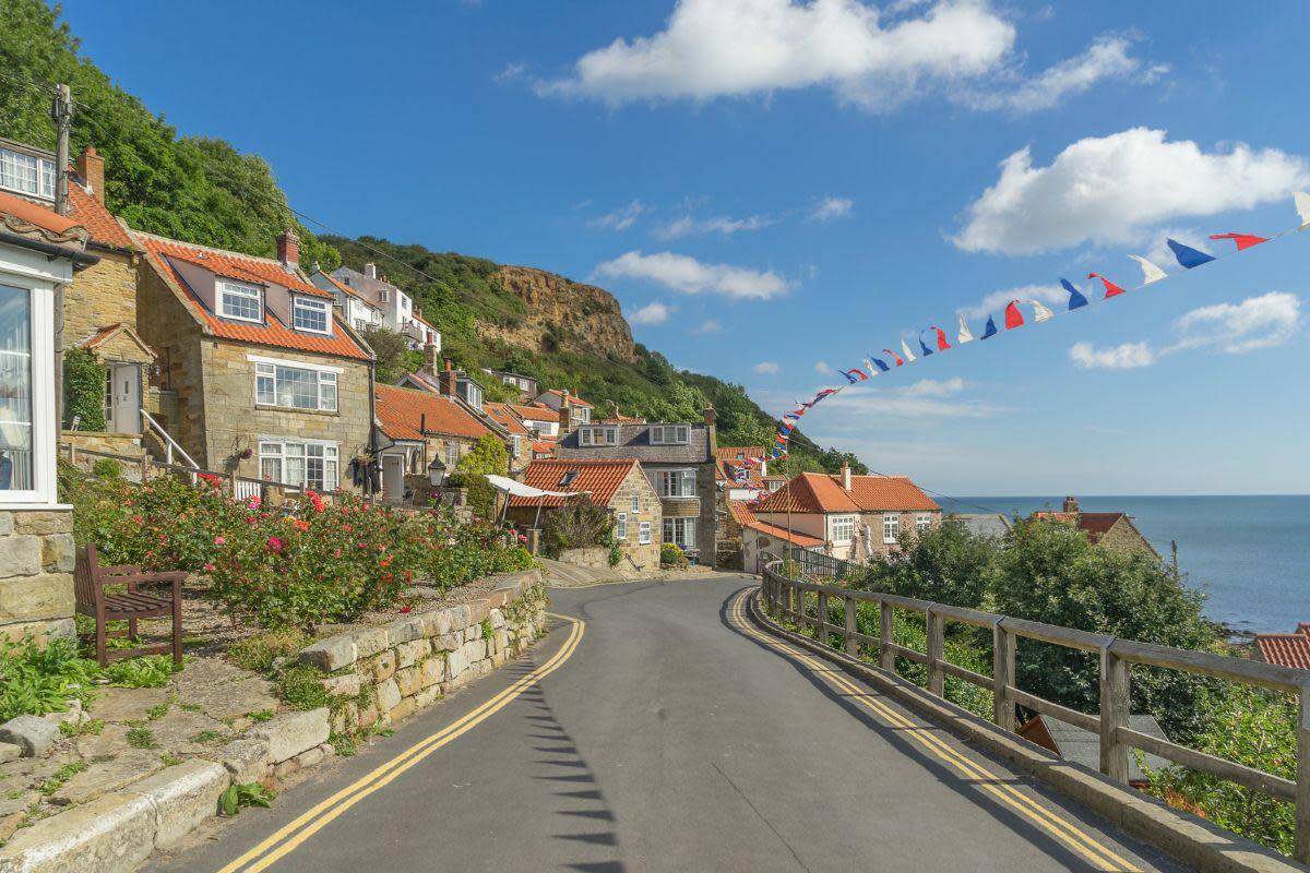 This is why Runswick Bay is one of the UK's most beautiful seaside villages to explore <i>(Image: Getty)</i>