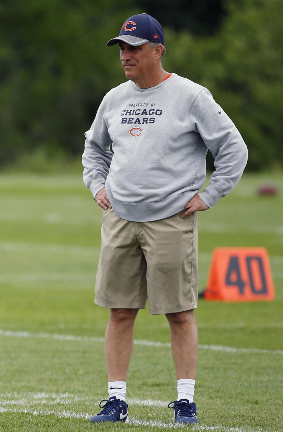 FILE - In this June 16, 2016, file photo, Chicago Bears defensive coordinator Vic Fangio watches during the NFL football team's minicamp at Halas Hall in Lake Forest, Ill. A person with knowledge of the decision tells The Associated Press that Denver Broncos general manager John Elway has decided on Chicago Bears defensive coordinator Vic Fangio as his new head coach. The person spoke on condition of anonymity Wednesday, Jan. 9, 2019, because the team hadn't announced the hiring. (AP Photo/Nam Y. Huh, File)